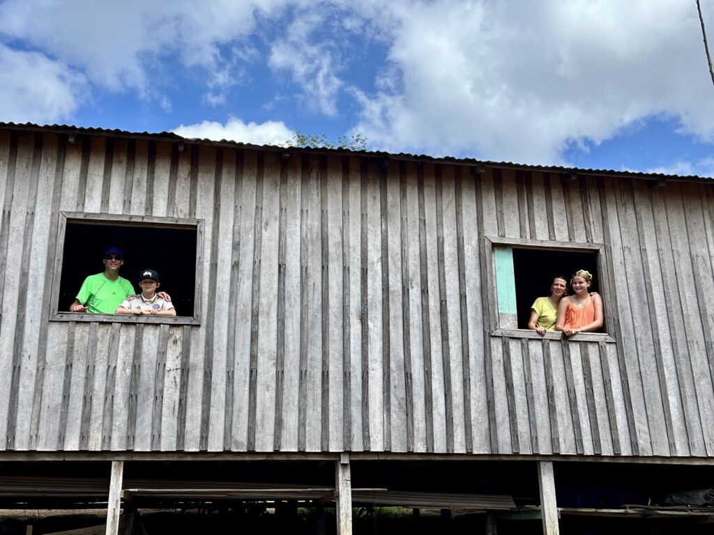 Guests visiting a riverside community